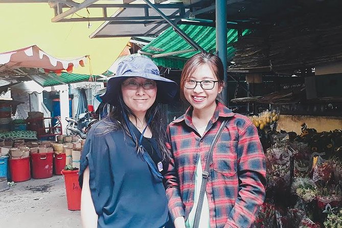 Afternoon Saigon Unseen Adventure by Scooter |Opt: Ao Dai Riders - Ho Thi Ky Flower Market and grilled oysters: smelling Vietnam, one bite at a time