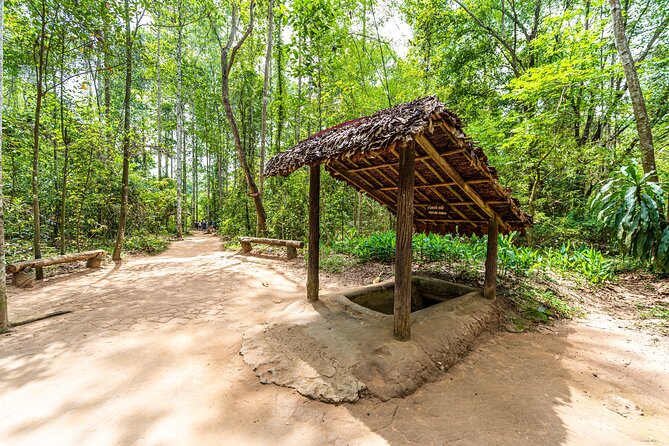 Cu Chi Tunnels and Mekong Delta 1 Day Tour from Ho Chi Minh City - Walking from exhibits to the real thing: workshops and the tunnel crawl