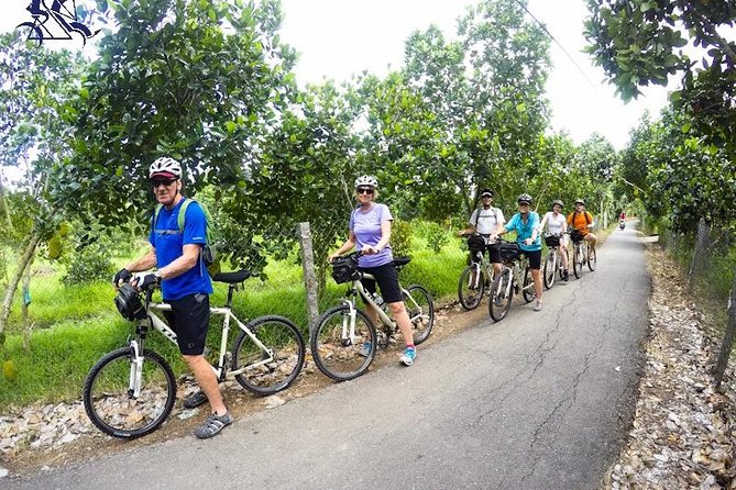 Cu Chi Tunnels - Cao Dai Temple & Black Virgin Mountain Full Day - The village-style travel moments: bicycle and boat time you’ll remember