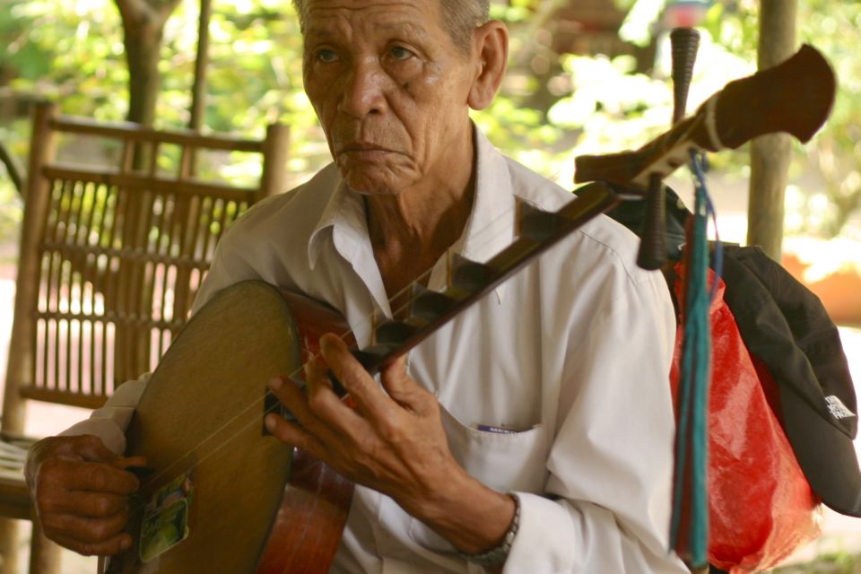 From Ho Chi Minh City: Mekong Delta VIP Tour by Limousine - Village walk: honey tea, honey wine, coconut candy, and traditional music