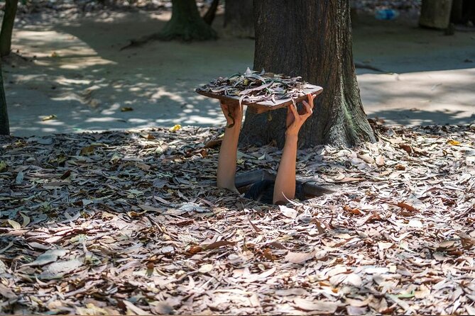 Half-Day Cu Chi Tunnels Guided Exclusive Experience with Pick Up - Above-ground war scars: bomb craters and visible evidence