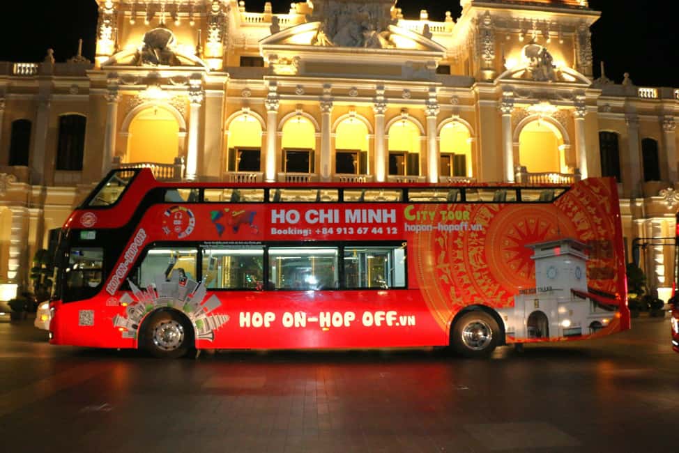 Ho Chi Minh City: Late-Night Open-Top Bus Tour - The non-stop route: District 1 to Ba Son Bridge and back