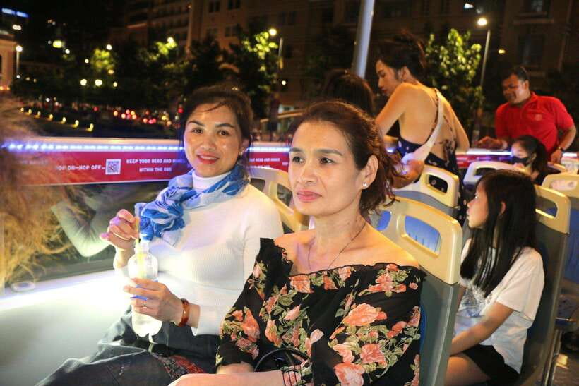 Ho Chi Minh City: Late-Night Open-Top Bus Tour - Comfort and weather: top deck reality at night