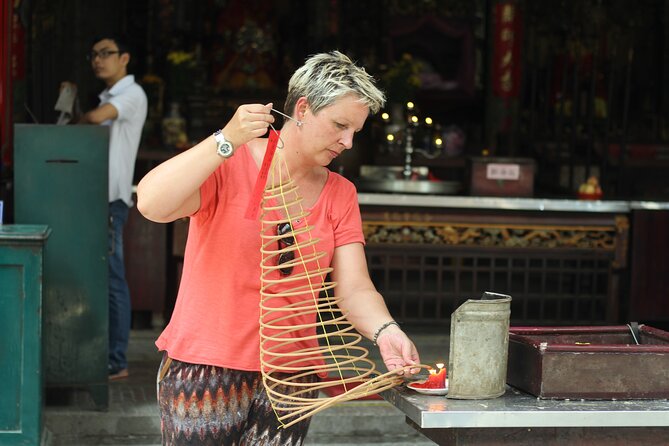 Ho Chi Minh City Motorbike Tour with Student | Saigon Adventure - The hidden pagoda moment: when the city quiets down