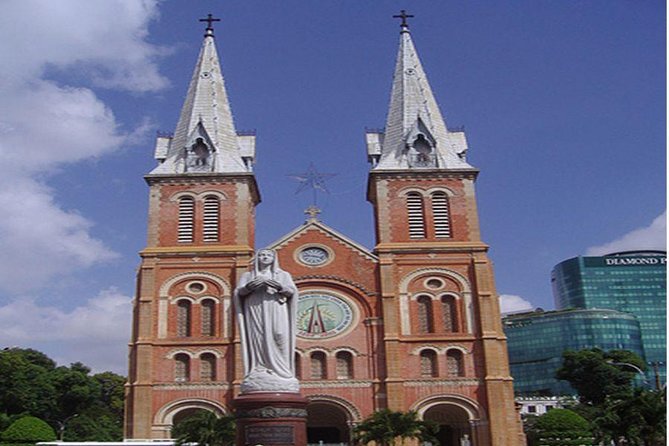 Ho Chi Minh City private full-day tour with Lunch included - Notre-Dame Cathedral of Saigon: the classic facade, with a maintenance note