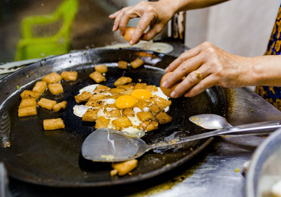 Ho Chi Minh City: Private Street Food Evening Walking Tour - Flower Market Finish: Dessert, Lotus Culture, and a Sweet Landing