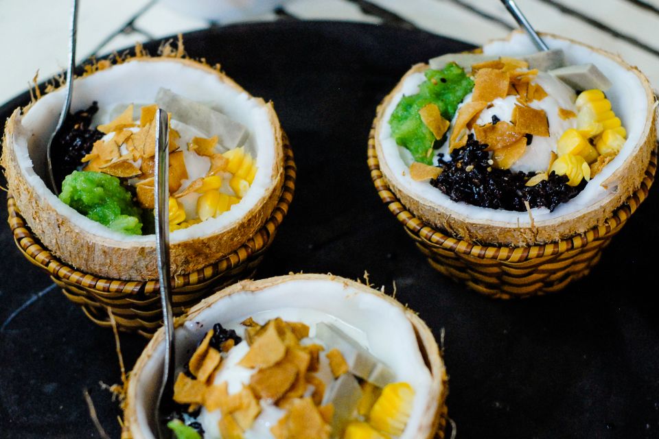 Ho Chi Minh City: Private Street Food Motorbike Tour - Clay-pot Bò Kho in District 10, then District 5 coconut ice cream