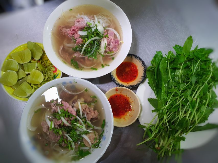 Ho Chi Minh City: Street Food and Sightseeing by Motorbike - A temple stop that connects faith and food culture