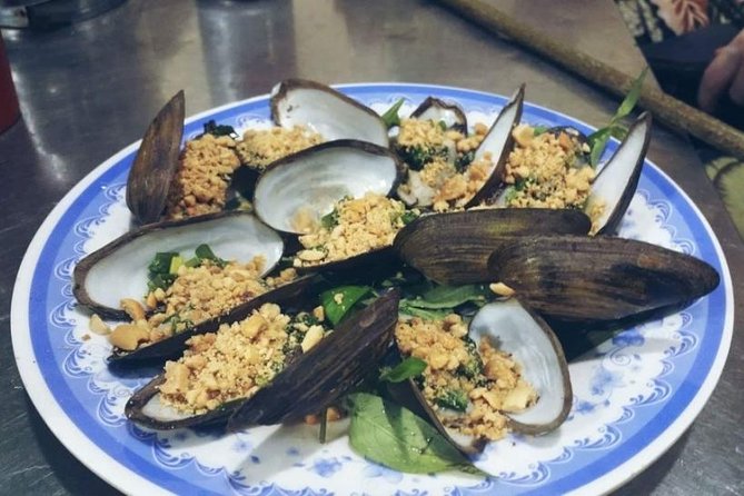 Ho Chi Minh City: Street Food Walking Tour with 12 Tastings - Safety and comfort considerations for scooter nights