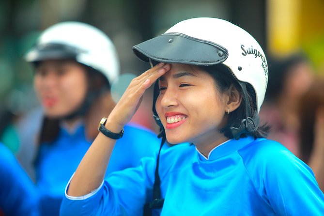 Ho Chi Minh City Tour by Motorbike with Female Riders | KissTour - The ride-through highlights: markets, landmarks, and a historic café moment