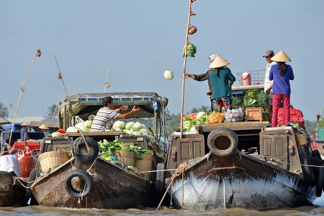 Mekong Delta 2-Day Tour: Floating Markets, Biking, Amazing Tour - Pickup in District 1 and getting on the road without losing your morning