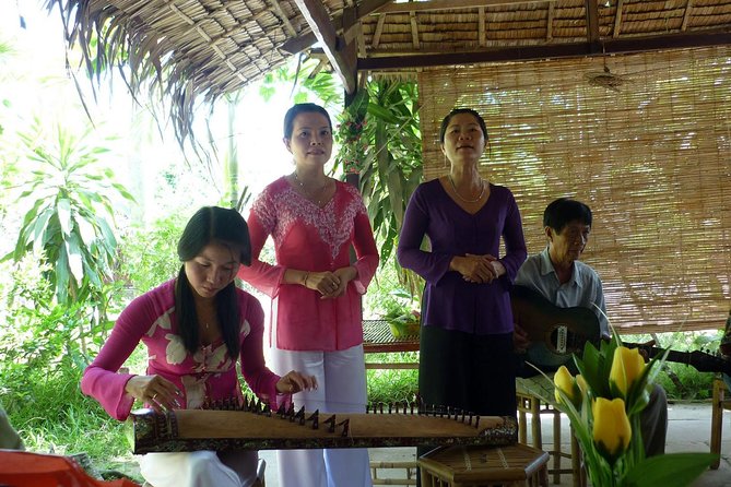 Mekong Delta Small Group Full Day Tour - My Tho Tien River cruise: boats, fishermen life, and four iconic islands