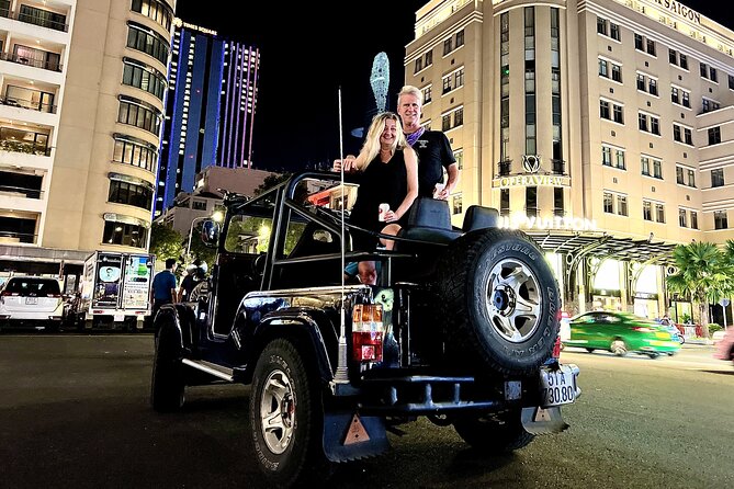 Private Jeep Tour Saigon by Night: Foodie & City Tour - Stop 1: Independence Palace by night lights