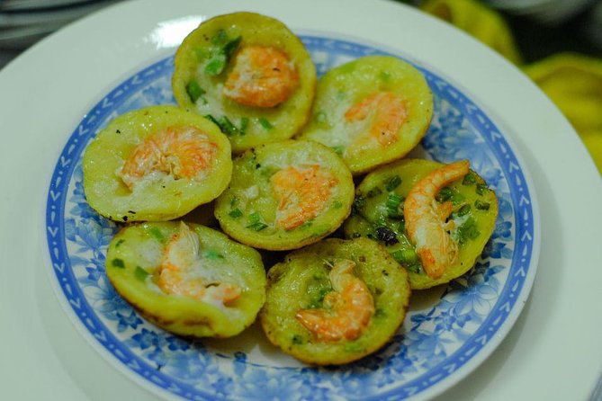 Private Street Food Motorbike Tour in Ho Chi Minh City - Stop 4: District 4 Seafood Dinner, Flan Cake, and the End of the Ride