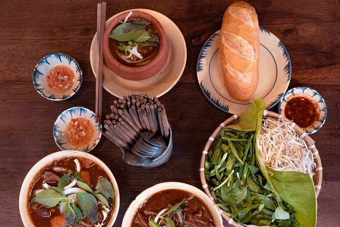 Private Street Food Motorbike Tour in Ho Chi Minh City - Drinks, Sticky Rice Wine, and How the Meal Stays Fun