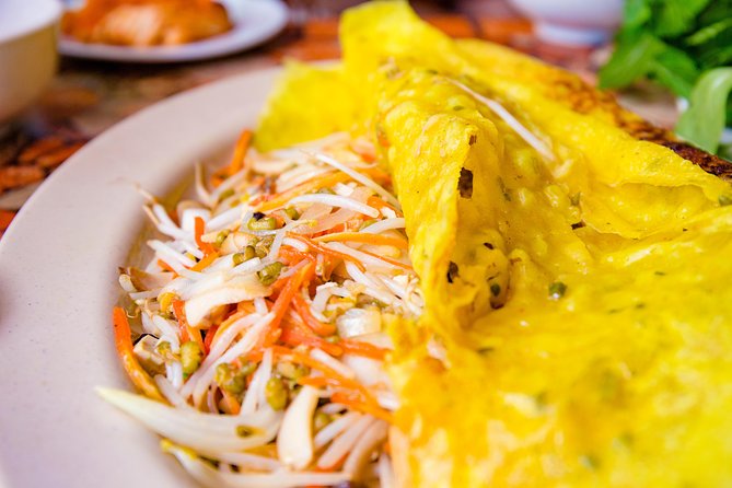 Private Vegan Food Tour By Scooter in Ho Chi Minh City - District 3 starter: Street Food Man and the Saigon story behind it