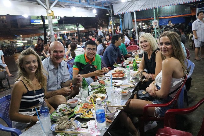 Saigon After Dark Vespa Street Food Tour + Live Music 4 hours - Seafood first, then banh xeo and nem lui: how the main food block lands