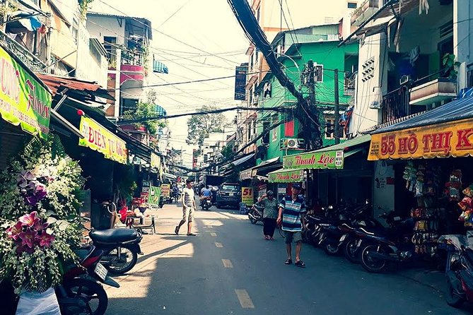 Saigon Afternoon Unseen Street Food by Scooter |Opt: Ao Dai Rider - Hotel pickup and the motorbike rhythm (what it feels like)