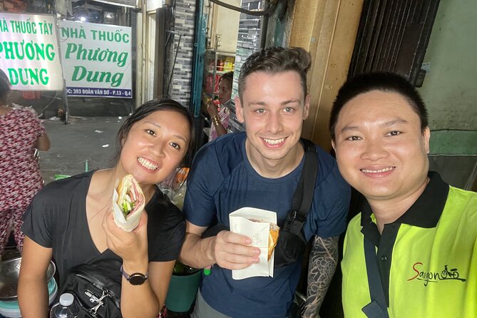 Saigon By Night and Street Food By Motorbike | Opt: Ao Dai Riders - The highlights that really matter