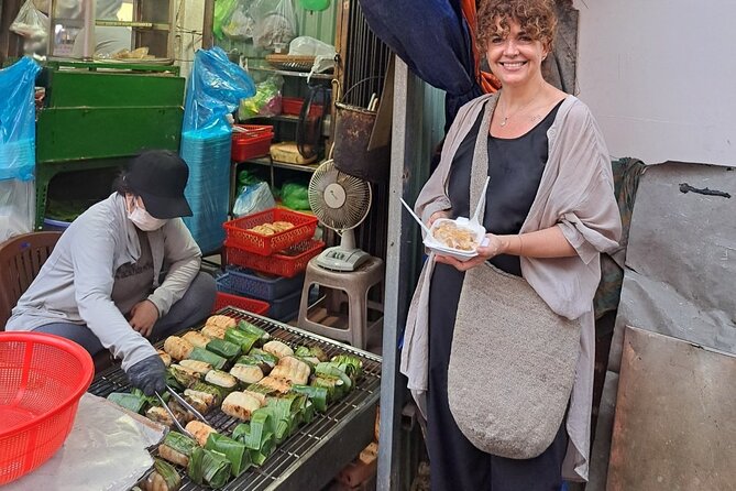 Saigon Food Tour by Scooter with Eleven Tastings - District 10 street food heaven: pancakes, betel leaf beef, bao buns, and more