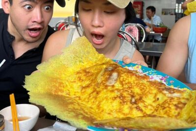 Saigon Food Tour by Scooter with Eleven Tastings - Stop 1 in District 3: banana sticky rice and a mini cooking start