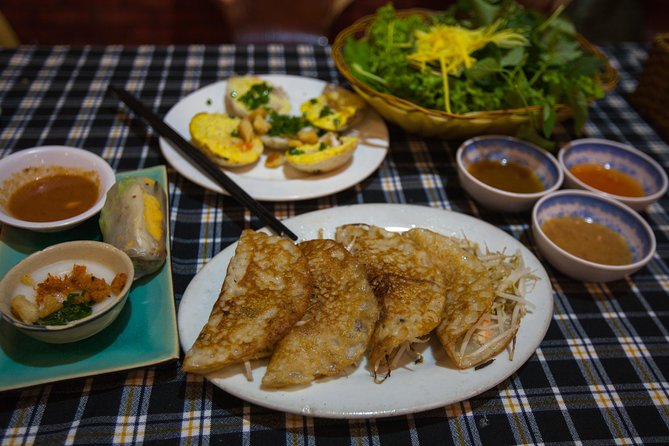 Saigon Night Street Food and City Tour on Scooter - Meeting at Saigon Central Post Office and Getting on the Scooter