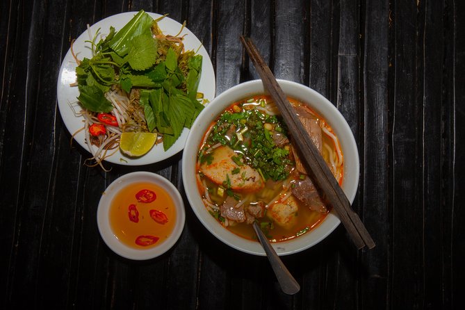 Saigon Night Street Food and City Tour on Scooter - Vietnamese BBQ Time: Street-Style Grilling and Beer Included