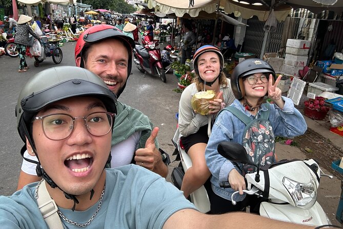 Saigon Private/Small Group Walking Food Tour with 13 Tastings - Ho Thi Ky Flower Market: grilled snacks, snails, and sugarcane with kumquat