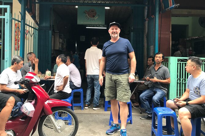 Saigon Slum tour and Saigon Chillspots by motorbike/ Aodai rider - The flower market break: making a lotus shape the local way