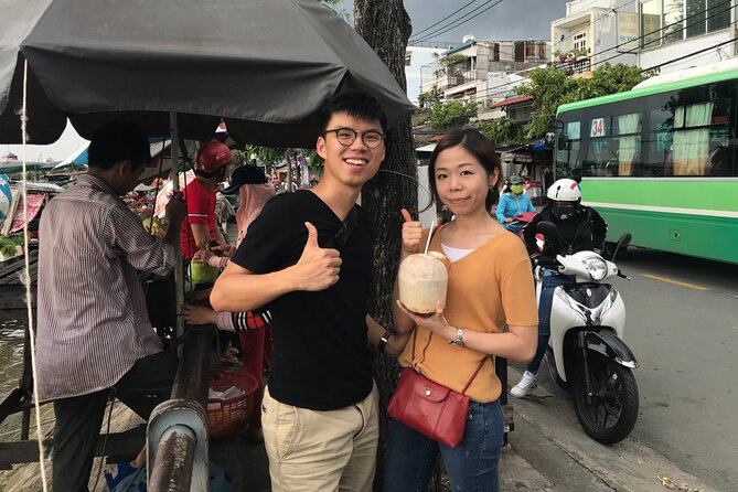 Saigon Slum tour and Saigon Chillspots by motorbike/ Aodai rider - Getting around safely: helmets, rain gear, and crowded streets