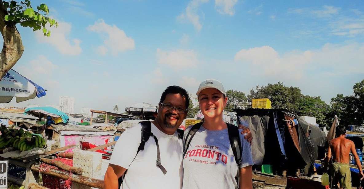 Saigon Slum Tour with Motorbike - From District 1 luxury streets to inner-city slums