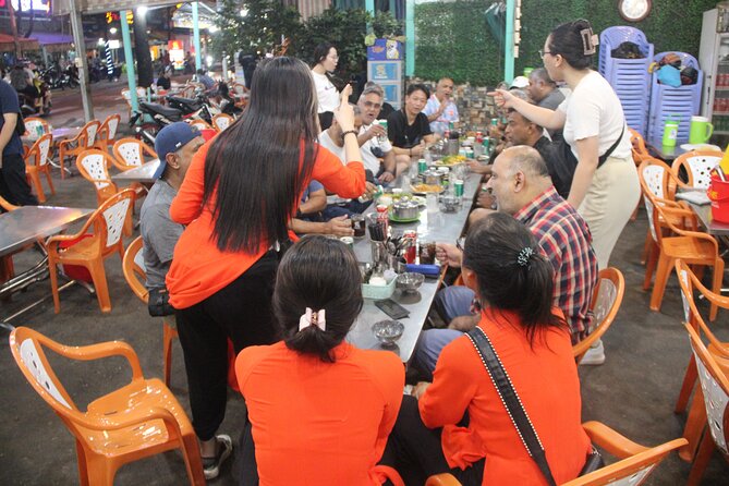 Saigon Vespa By Night Street Food With Female Riders Ao Dai - Coffee shop and music bar: seeing nightlife, not just eating it