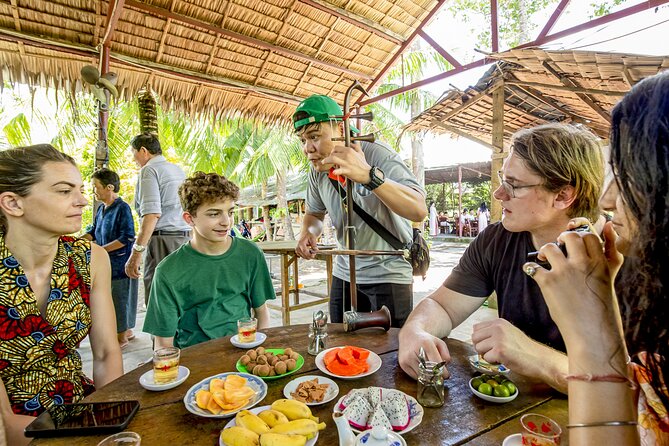 Small-Group Mekong Delta Day Trip: Boat Ride, Cottages & Pagoda - Lang Xanh Ben Tre lunch: a full 5-course meal by the water