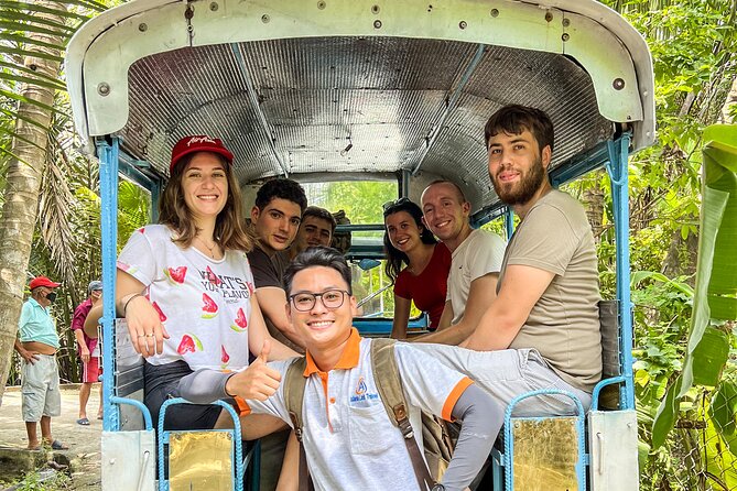 Small-Group Mekong Delta Day Trip: Boat Ride, Cottages & Pagoda - Biking through a village or taking it easy