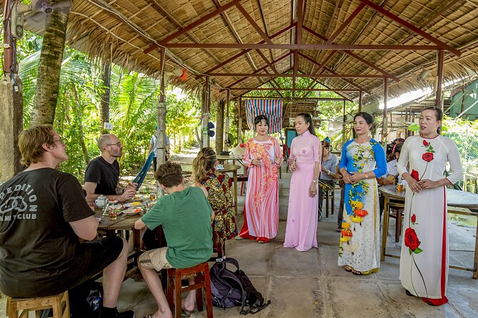 Small-Group Mekong Delta Day Trip: Boat Ride, Cottages & Pagoda - Singing ladies, animals you might meet, and the surprises