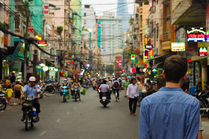 Small group Saigon Inside Out by Motorbike for 3 Hours - Stop-by-stop: from Ho Thi Ky Flower Market to central Saigon landmarks